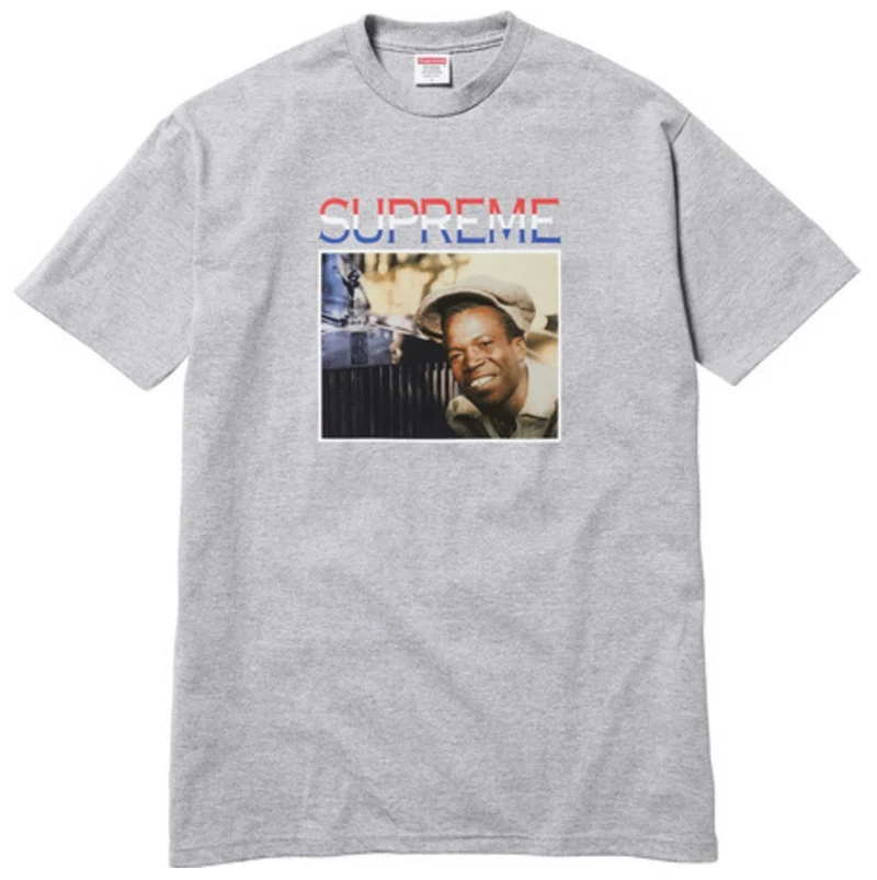 SUPREME - ENGLISHMAN TEE (HEATHER GREY)